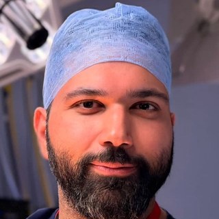 Mr Torath Ameen, Consultant Urologist, in theatre
